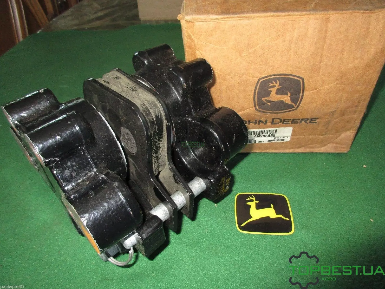 AN206558 Суппорт гальмівного диска John Deere